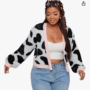 Woman’s plus size graphic cardigan sweater